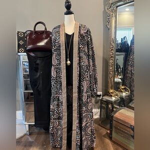 This new long kimono is great for fall the design is amazing